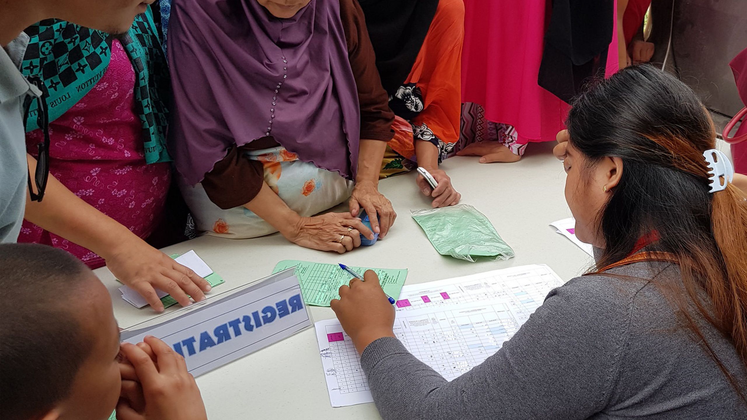 Catholic Relief Services, Start Fund Alert 165, Philippines. Registration of beneficiaries by volunteers in Marawi.