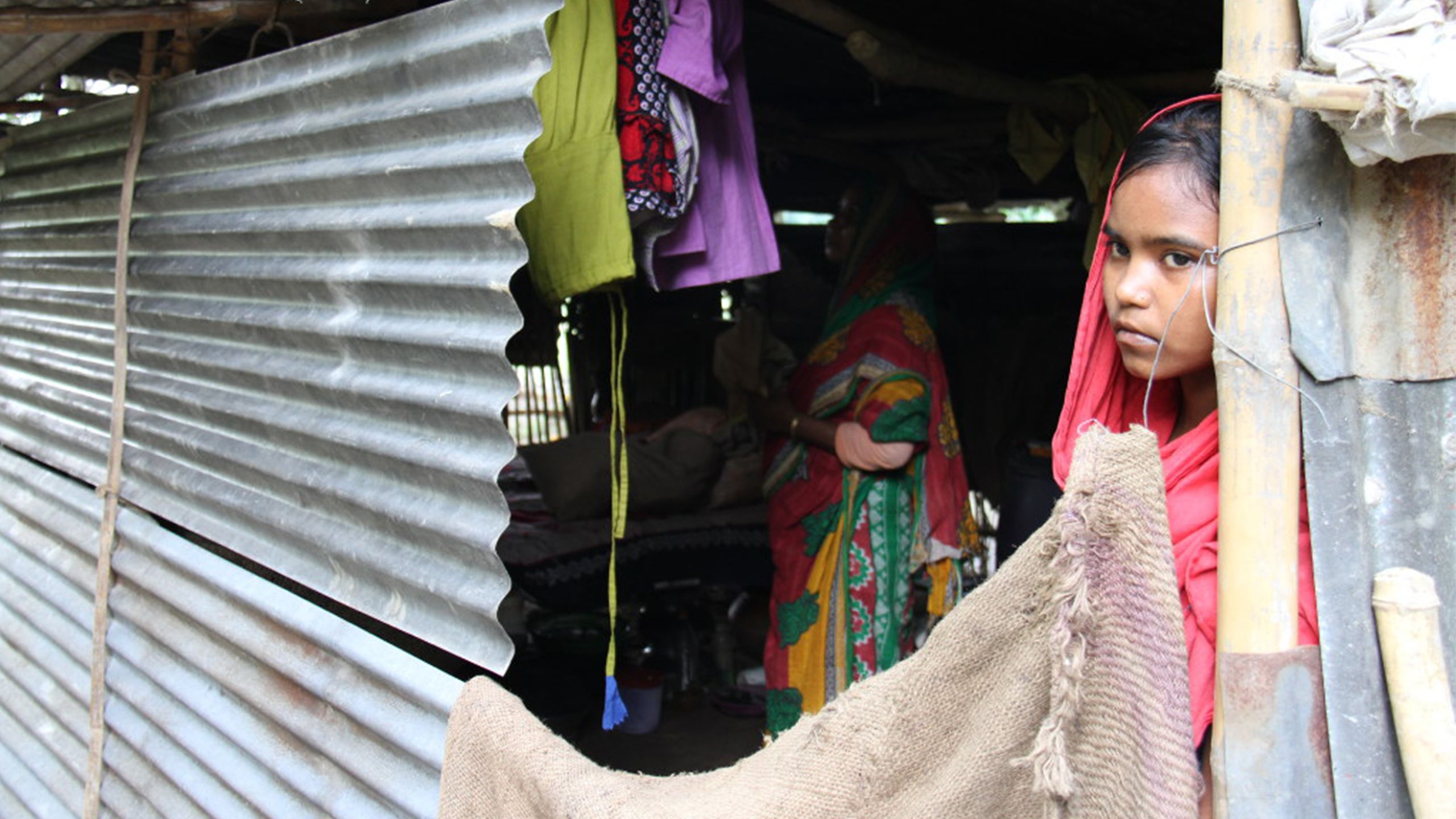 Sharmin's home was ravaged by Bangladesh floods in June 2017. Her family was provided with cash to help them in the aftermath. Photo by Himaloy Joseph Mree, World Vision, alert B002 Bangladesh.