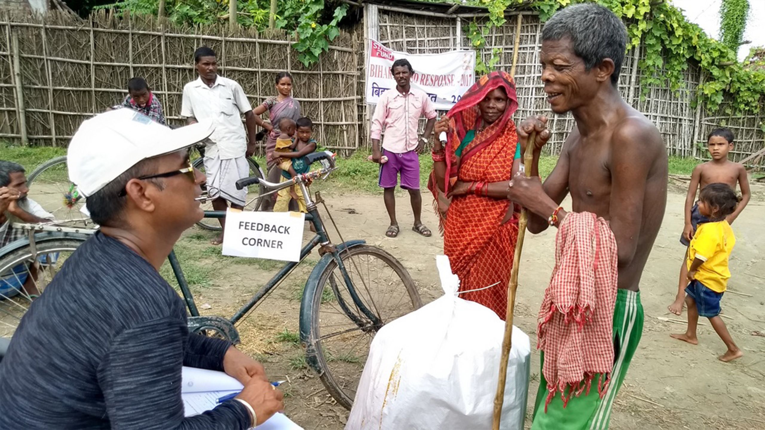 A man affected by flooding in India provides feedback on the support he received from CARE international. Image by CARE India, alert 180.